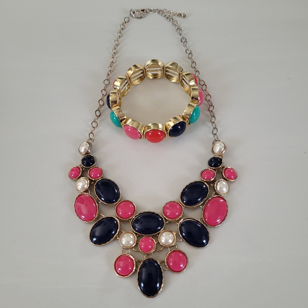 CHARMING CHARLIE navy, pink, and faux pearls on gold-tone